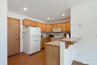 Kitchen offers large pantry, open floor concept, close to deck to BBQ!