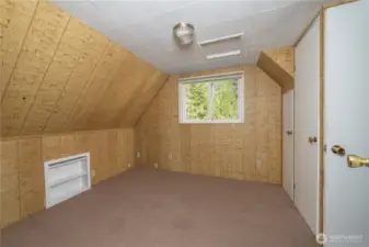 Upstairs bedroom with half bath