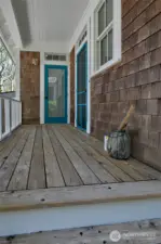 The back covered porch offers direct access to the back bathroom and laundry.