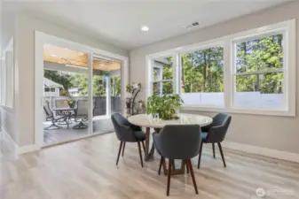 Dining area leads out to the outdoor lounge space