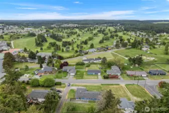 Overlooking the golf course and towards the Olympic Mountains which are viewable on clear days.