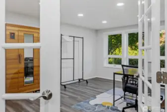 Lower level office/den or 5th bedroom with red light sauna