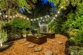 Raised garden beds w/ potters shed including fan & watering system