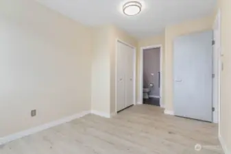 Perfect for family or guests, the second bedroom offers its own private 3/4 bathroom for added comfort and convenience.