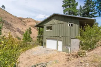 Drive through garage in the basement.