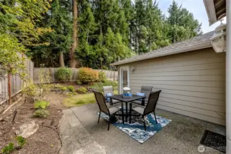 Enjoy outdoor living on this secluded patio.