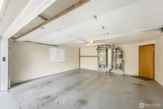 Ample 2-car garage with clean, finished interior.