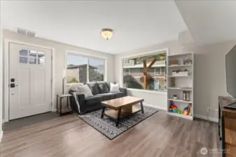 Enjoy the family room with entrance to driveway, patio and backyard! This room is light, bright and easy to maintain with luxury vinyl planked floors.