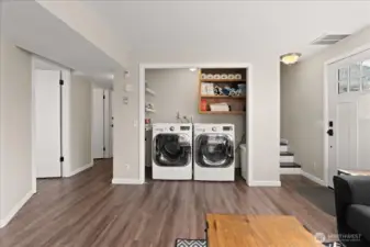 Laundry and storage area on lower level. LG Washer and dryer included!