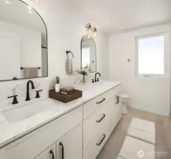 VPrimary bath with double sinks virtually staged