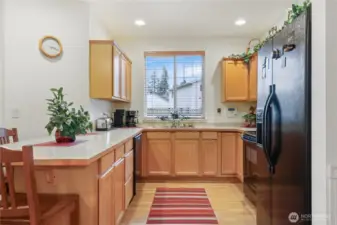 Inviting kitchen with pantry for all of your storage needs