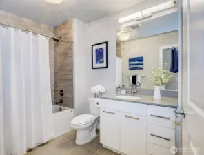 Second full bath, lots of storage and quartz counters.