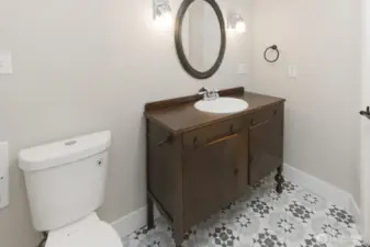 Upstairs bathroom with tub