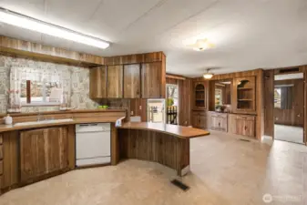 Open Kitchen w/ newer vinyl flooring