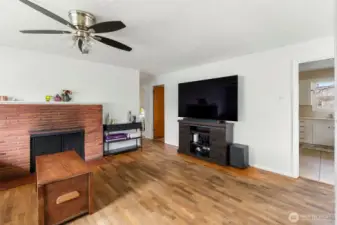 Living room with original hardwood
