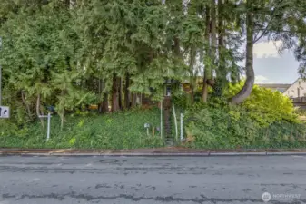 Access is from the Alley. Frontage improvements are already in place. There is one sewer stub and one water stub in place.