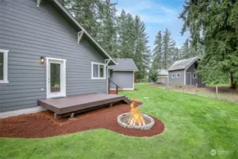 Rear yard and deck with firepit