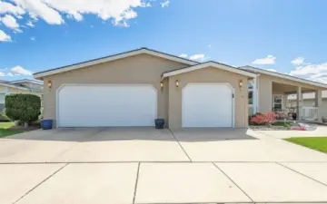 Check out this 3-car garage and ALL this extra parking!