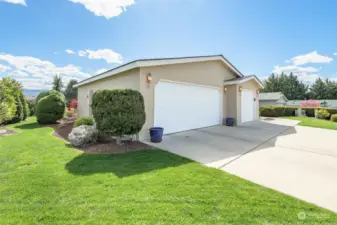 Immaculate landscape surrounds this lovely home