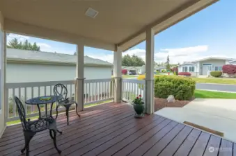 Enjoy this front porch in any season. Guests will enjoy standing under shelter while ringing your doorbell!