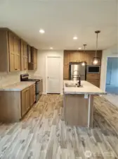 Door from kitchen leads to the utility room