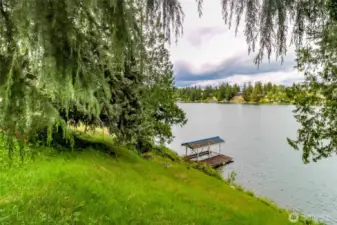 View of boat dock and lack from back of top level