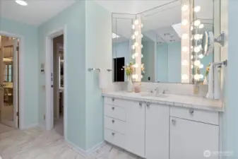 Primary bath is generous and original, with two generous his/hers closets and dressing areas.