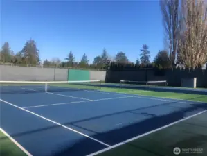The tennis courts are adjacent to the pool and clubhouse. Basketball and pickle ball are available at the nearby community park.
