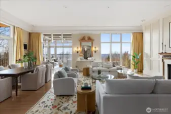 . . . Leading to a grand Great Room of windowed walls. . .