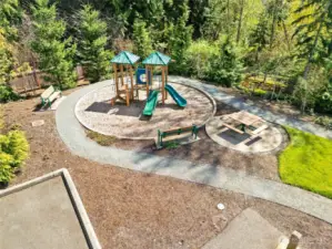 The community playground is just steps away from the home.