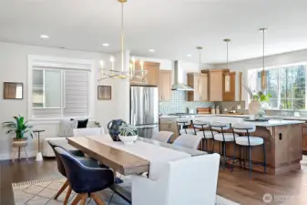 Open-concept living with the dining and kitchen in view.