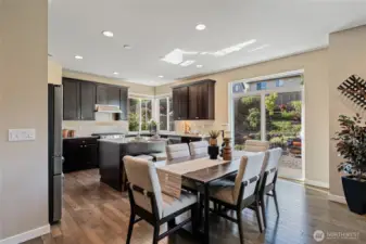 Love the open floor plan which allows easy flow and communication between the kitchen and family room.