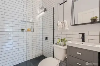 Main floor remodeled bathroom with new shower for added convenience (3rd shower).