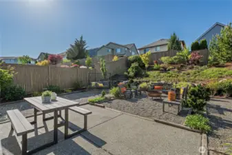 Big patio plumbed for future hot tub. Great space for kid pool, chalk drawings, or outdoor lounge chairs to soak up the sun.