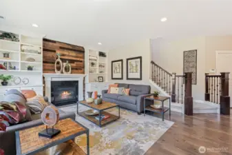 Hardwood flooring throughout the main living area works great for traffic coming and going.