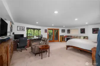 Primary bedroom is expansive and open