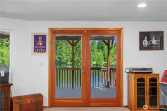 French doors leading to the 2nd covered deck looking to the lake.