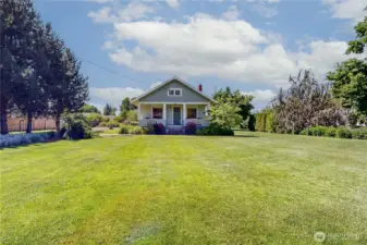 Front lawn home is set far back from the street