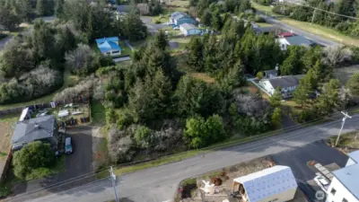 Sizable lot - build separate properties or combine the lot.