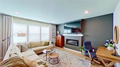 Living room with wiring for flush-mount TV