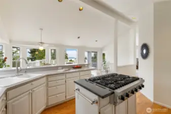 From the heart of the home, enjoy sweeping views through a wall of win.dows that lead to the expansive deck. Whether you're cooking, entertaining, or simply enjoying a quiet moment, this space invites you to take it all in.