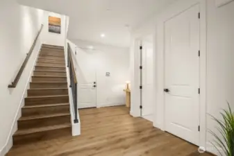 Main floor entry, foyer and Garage access.