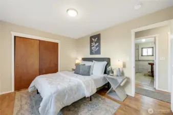 Primary Bedroom with view of the water
