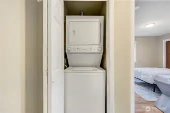 Stackable laundry in the hallway