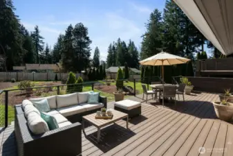 This huge deck as room for many entertaining areas