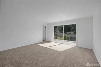 Primary bedroom has brand new french doors leading to its private deck