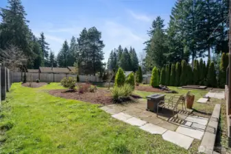 This is one of two patio areas you can enjoy your back yard