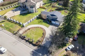 Nice area view of your front yard and U shaped gated driveway