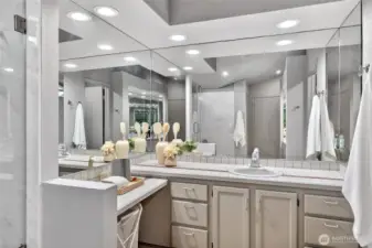 Spacious primary bath with extended vanity, ample storage & great lighting. Clean finishes & functional layout create a bright, comfortable space.