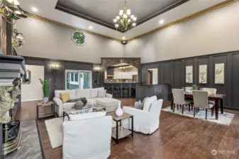 Room for your grand dining plans, and brick accented arch surround flows right to the sliding glass door leading to the backyard in this open, grand great room.